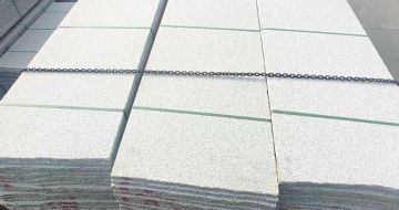 来宾芝麻白毛板，石材毛板