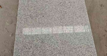 来宾芝麻白光面毛板